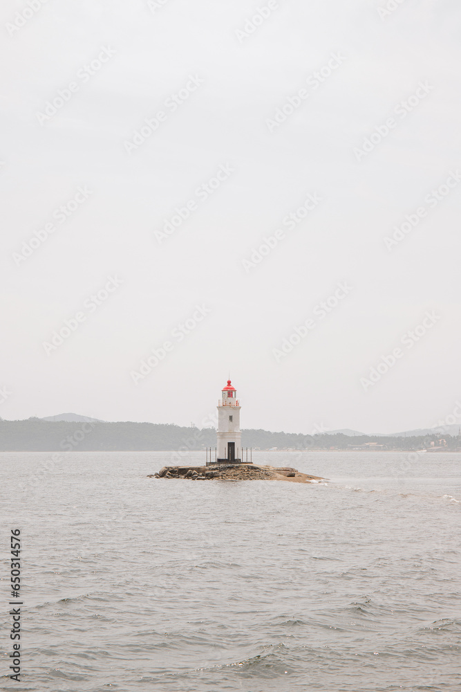 Tokarevsky lighthouse on the shore in the city of Vladivostok.