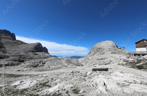 mountain view of the European Alps of the Dolomite group and building called RIFUGIO ROSETTA photo