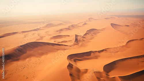 Aerial Drone Perspective Reveals the Vast Desert Landscape..