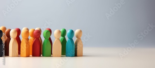 Photo Wooden and colored figures representing diversity and inclusion