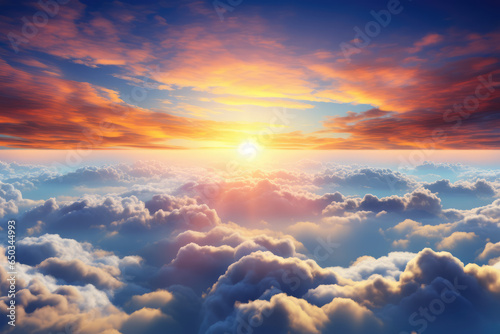 Beautiful sunset sky above clouds with dramatic light. Cabin view from airplane. High quality photo