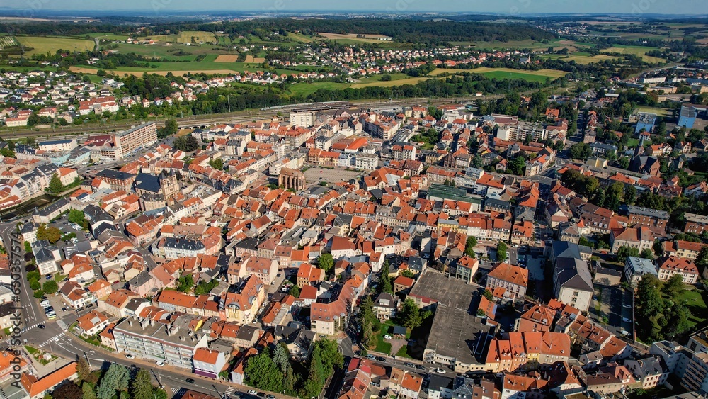 Aerial of the old town around the city Sarrebourg in France on a sunny day in late summer.