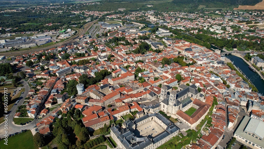 Aerial of the old town around the city Verdun in France on a sunny day in late summer.

