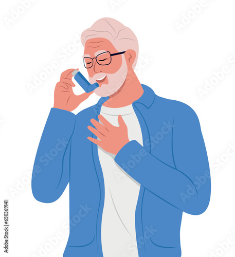 Elderly man uses an asthma inhaler against attack. World asthma day. Bronchial asthma. Allergy, asthmatic. Inhalation drug.