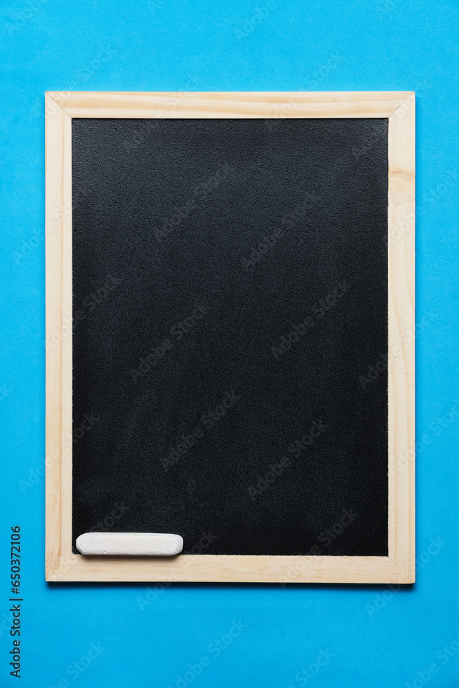 Chalkboard with chalk on bright blue background. Chalkboard with chalk on bright blue background.