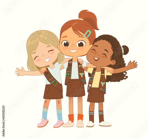 Happy multi ethnic multi aged Brownies girls scout hug. Girls Scout happily hug and smile. Girl together. Brownies Girls Scout