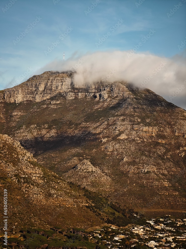Majestic mountain peak surrounded by white clouds in South Africa
