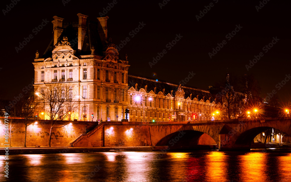 Louvre and Pont Royal at night
