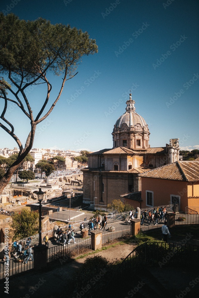 Image features a stunning view of the ancient city of Rome, Italy