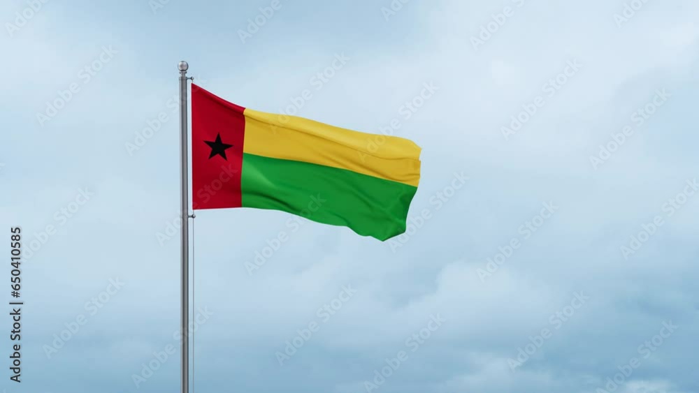 Guinea-Bissau flag waving in the wind, cloudy blue sky with running clouds, endless seamless loop Guinea-Bissau flag waving in the wind, cloudy blue sky with running clouds, endless seamless loop
