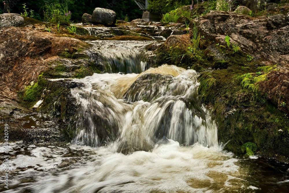 Fototapeta premium Scenic view of Myllykoski rapids in Nurmijarvi, Finland