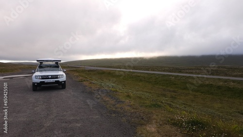 car on the road iceland