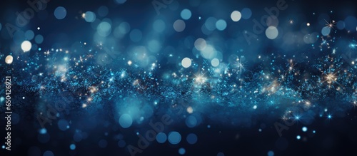 Festive blue background with twinkling stars and snowfall