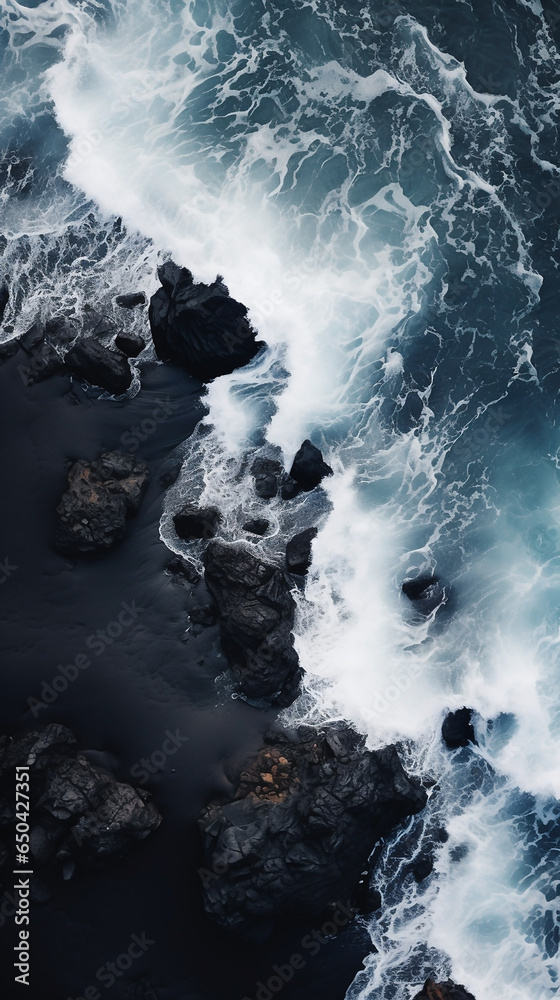 Aerial View Capturing Ocean Waves Crashing on Rocks and a Black Sand Beach - A Testament to Nature's Dramatic Beauty. Generative AI.