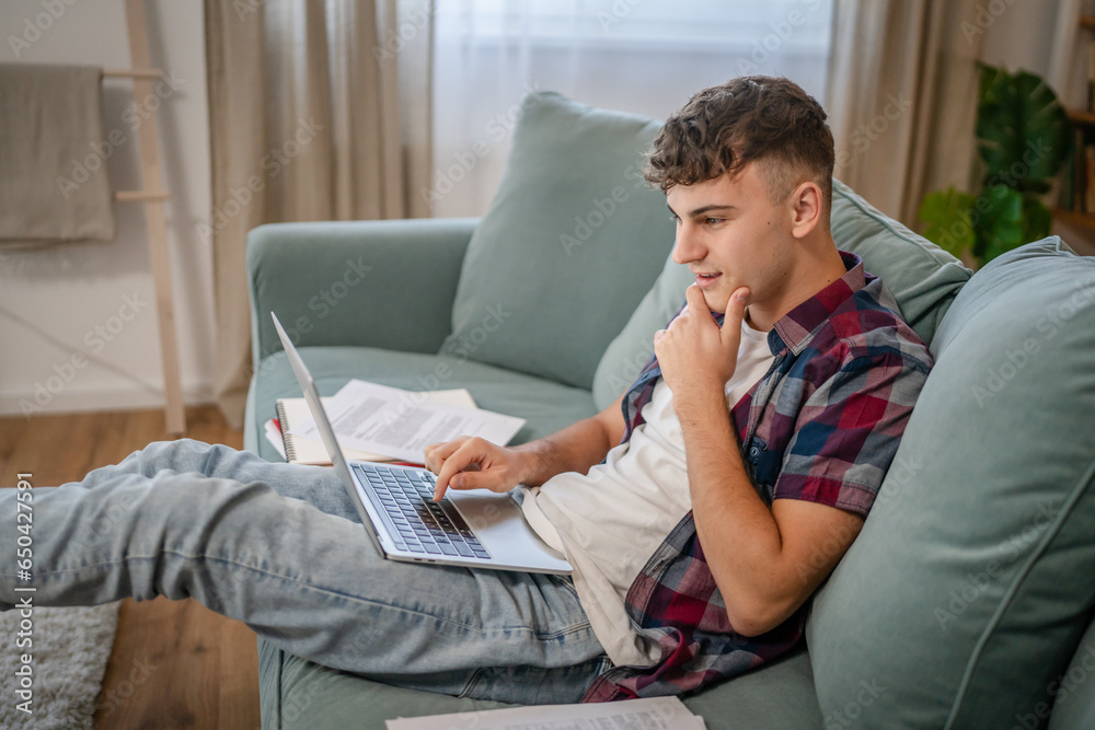 Young caucasian man teenager student study at home Young caucasian man teenager student study at home