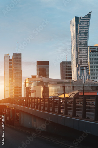 Warsaw downtown skyline at sunset, skyscrapers of financial district 