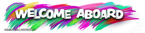 Welcome aboard paper word sign with colorful spectrum paint brush strokes over white.
