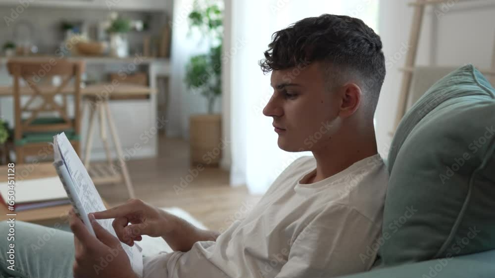 Young caucasian man teenager student study at home Young caucasian man teenager student study at home