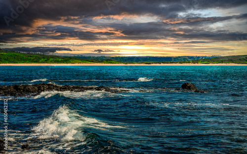 The magnificent sea view,turbulent wave and beautiful sandy beach in the distance  form a scenic scene.High quality photo photography in Penghu County, Taiwan.Use in branding, screensavers, websites, photo