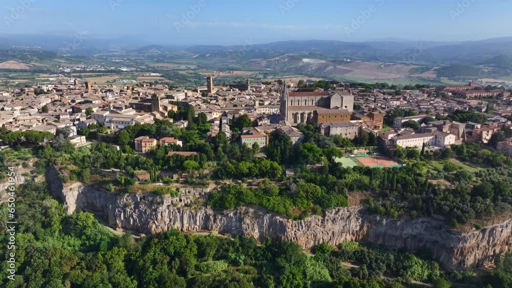 Beautiful aerial view of the ancient etruscan town of Orvieto on a sunny day with blue sky in summer, Umbria, Italy Beautiful aerial view of the ancient etruscan town of Orvieto on a sunny day with blue sky in summer, Umbria, Italy