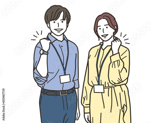 ガッツポーズする男女のビジネスパーソン達