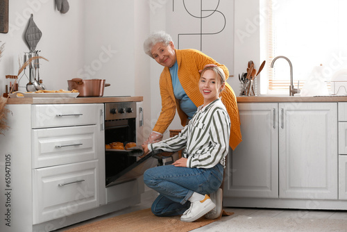 Young woman with her grandm...