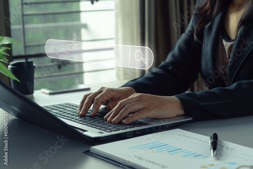 Businessman using laptop,search engine with strategic optimization techniques digital marketing, web, online connectivity. Business investment information search. Information search technology concept