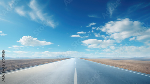 Empty Road trip straight towards highway horizon clouds bright blue sky created with Generative AI Technology