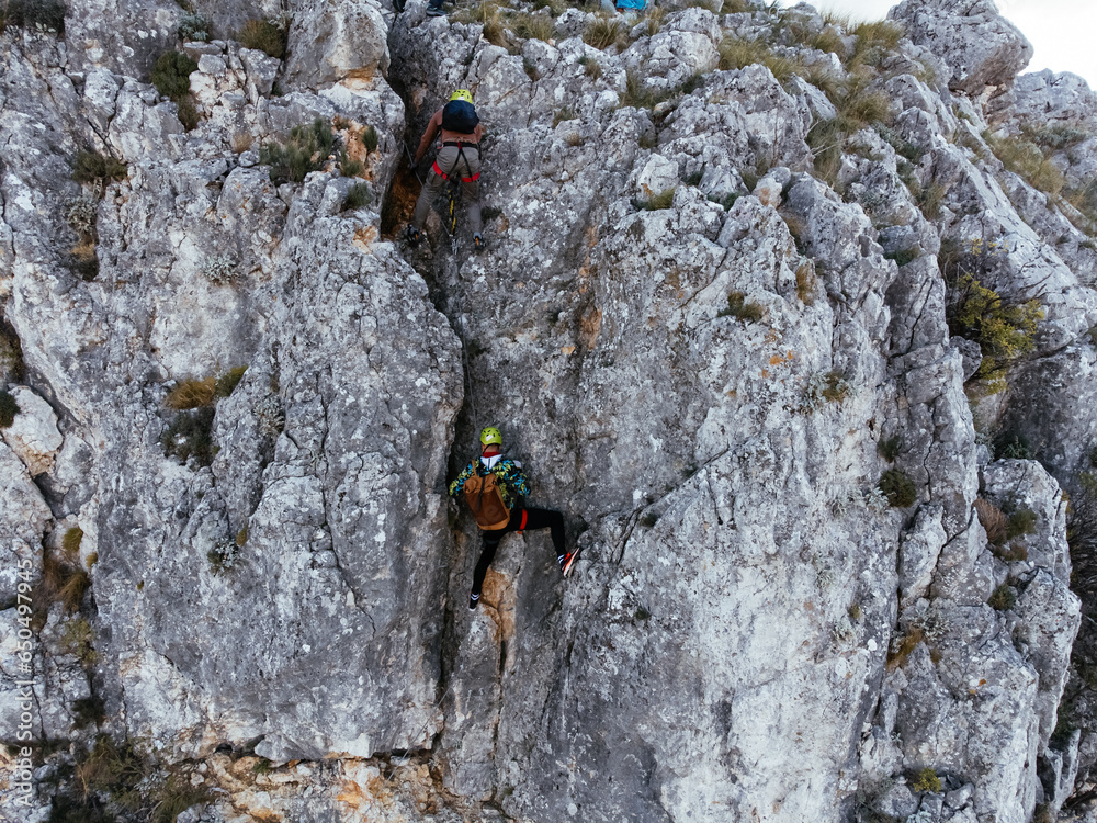A group of tourists are climbing on Via Ferrata Mostar, Bosnia and Herzegovina.