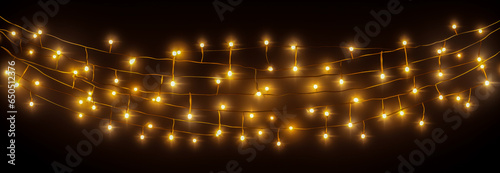 Christmas lights. Glowing garland on dark background.