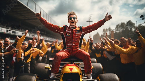 Formula one racer on the car celebrating after winning the race photo