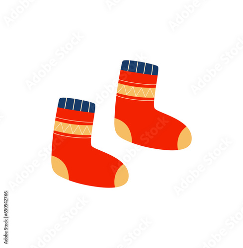 Warm knitted red socks isolated on white background. Autumn and winter cozy season. Accessorize.