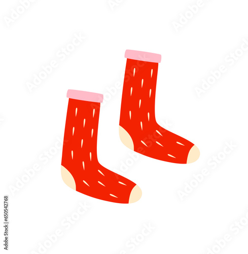 Knitted red stockings isolated on white background. Long socks. Autumn and winter cozy season. Accessorize. Christmas and New Year time.