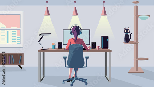 A woman back view operating a desktop computer in a bright room. Remote work.