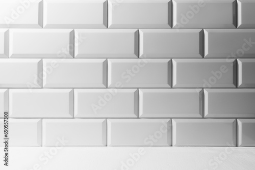 Soft light white abstract scene grey gradient of white glossy ceramic rectangle tiles on wall, wood floor mockup. Abstract interior of bathroom, kitchen, spa salon or scene for presentation, design. © finepoints