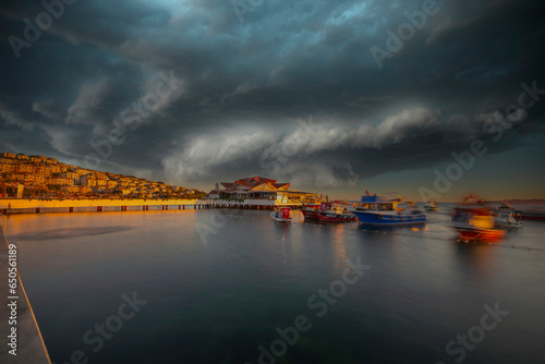 Istanbul Buyukcekmece beach sunset and boats photo