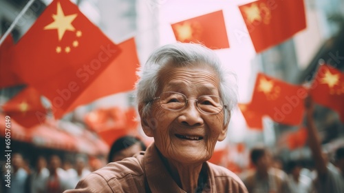 Old wrinkled person from Hong Kong With country flag waving in air.