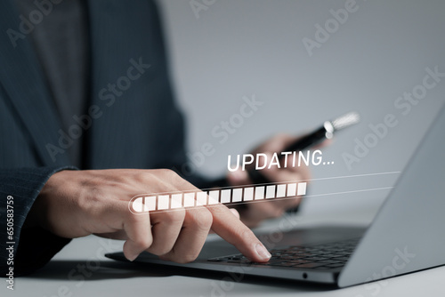 Software updates and change concepts. User install operating system updates or software upgrades, download new versions, security updates. photo