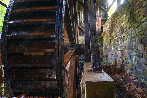 Giant colonial American wooden water wheel