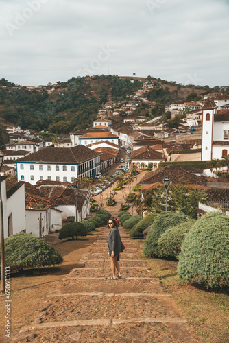 Brazilian on the Serro old town steps in the state of Minas Gerais.  Brazil. The city belongs to the wider metropolitan area of Belo Horizonte. photo