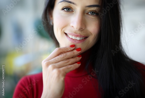 Canvas Print Woman's smile and fingers with red nails