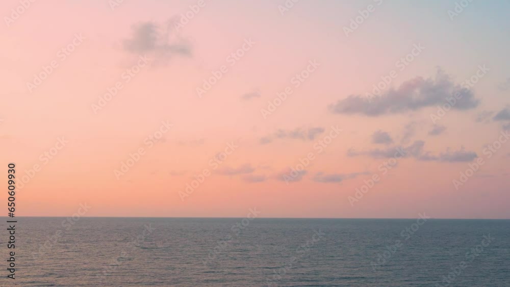 Sea at Sunset Time Lapse, Orange Blue Evening Sky Colorful Clouds and Ocean, Beach, Horizon, Travel, Aerial View of Sunset Sea and Sky with Clouds. Beautiful Background Relax, Beauty, Planet. Sea at Sunset Time Lapse, Orange Blue Evening Sky Colorful Clouds and Ocean, Beach, Horizon, Travel, Aerial View of Sunset Sea and Sky with Clouds. Beautiful Background Relax, Beauty, Planet.