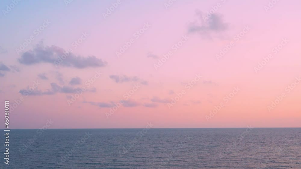 Time Lapse Sunset Ocean Colorful Sky and Few Fluffy Colored Clouds Horizon Background 4K. Beautiful Aerial View of Evening Sea and Sky Planet World Travel Vacation Relax Beauty Background 4K Seascape. Time Lapse Sunset Ocean Colorful Sky and Few Fluffy Colored Clouds Horizon Background 4K. Beautiful Aerial View of Evening Sea and Sky Planet World Travel Vacation Relax Beauty Background 4K Seascape.