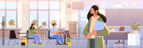female teacher with book in classroom happy labor day celebration concept horizontal portrait