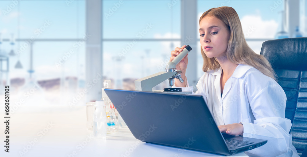 Woman biologist. Girl with microscope and laptop. Student at laboratory table. Woman biologist in white coat. Lady doing scientific experiments. Biologist uses electron microscope. Art focus Woman biologist. Girl with microscope and laptop. Student at laboratory table. Woman biologist in white coat. Lady doing scientific experiments. Biologist uses electron microscope. Art focus