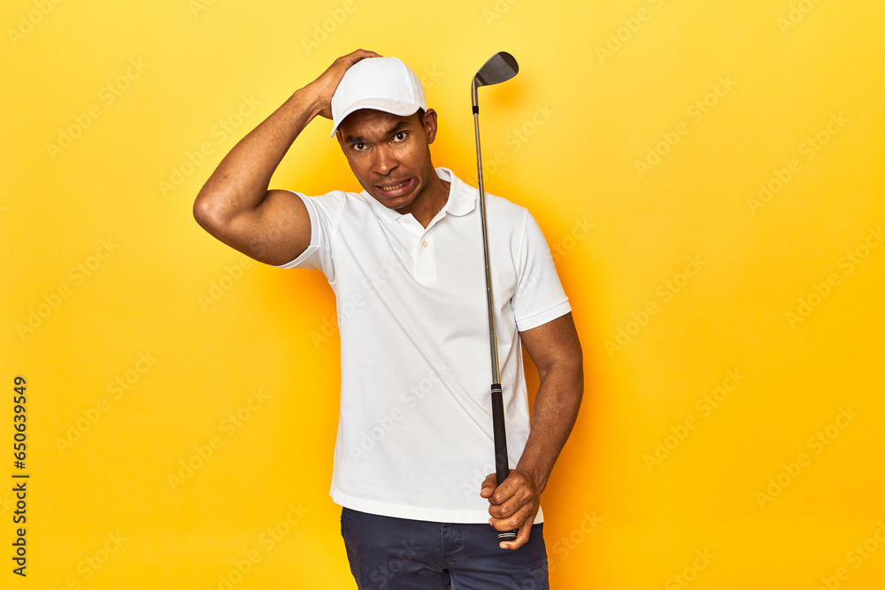 African American man golfer, yellow studio backdrop, being shocked, she has remembered important meeting.