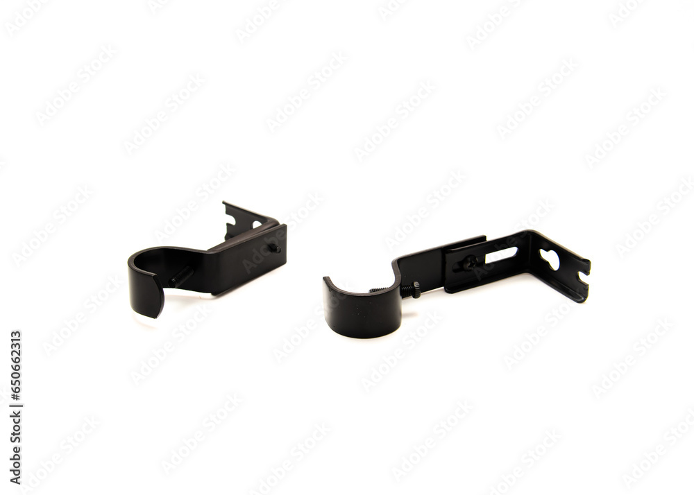 Double adjustable curtain rod brackets made of sturdy steel in bronze finish isolated on white background, interior windows curtains accessories Double adjustable curtain rod brackets made of sturdy steel in bronze finish isolated on white background, interior windows curtains accessories