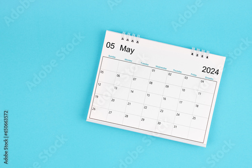 The May 2024, Monthly desk calendar for 2024 year on blue color background.