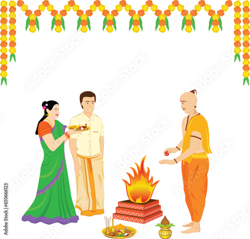 Indian Couple in traditional wear and Indian priest performing pooja.