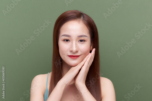 Portrait of young woman with perfect skin clean